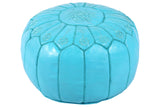 Turquoise embroidered leather pouf 43
