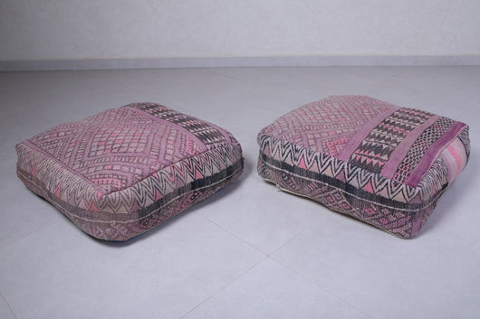 Two handmade vintage moroccan berber poufs