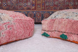 Two handmade berber old rug poufs