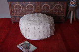 Handwoven berber moroccan woven rug pouf