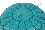 Bright turquoise leather pouf 18
