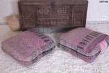 Two handmade vintage moroccan berber poufs