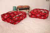 red poufs